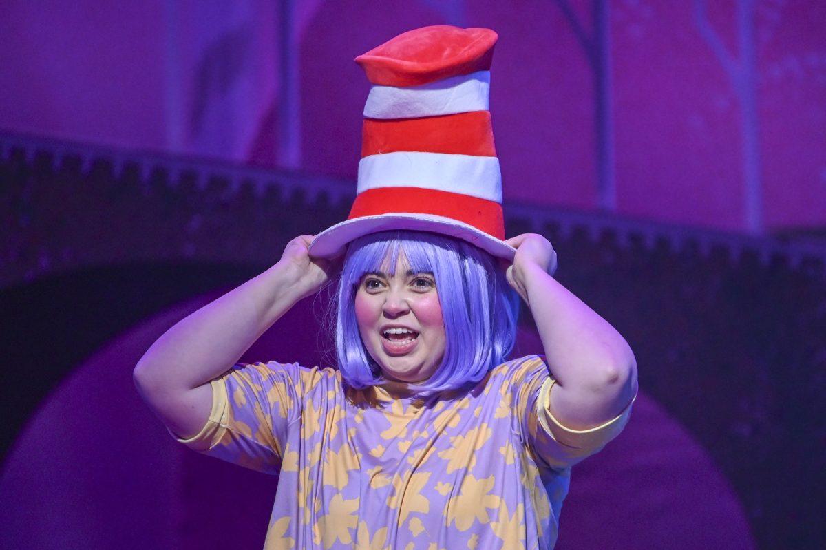 Playing as the character Jojo, Alex Barr, a third-year studying psychology, puts on the hat, signaling the end of the musical during the Seussical performance in Stewart Theatre on Tuesday, Feb. 18, 2024. The musical showcased familiar Dr. Seuss characters including Horton the Elephant, Lazy Maizie, and the inhabitants of Whoville.
