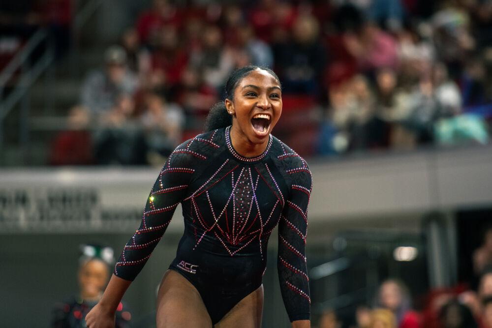 Freshman Syniya Thomas shouts during the meet against California in Reynolds Coliseum on Sunday, Feb. 2, 2025. Thomas scored 9.875 points in the floor routine. The Wolfpack lost to the Bears 197.175-196.550