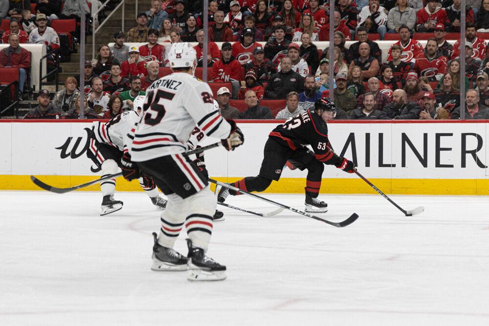 Right Wing Jackson Blake rushes past defenders during the game versus the Chicago Blackhawks at the Lenovo Center on Thursday, Jan 30, 2025. The Hurricanes beat the Blackhawks 3-2.
