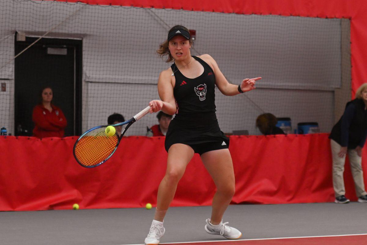 Junior Anna Zyryanova corners the ball during the match against Michigan at J. W. Isenhour Tennis Center on Friday, Feb. 14, 2025. Zyryanova lost her singles match 2-1. NC State beat Michigan 5-2.