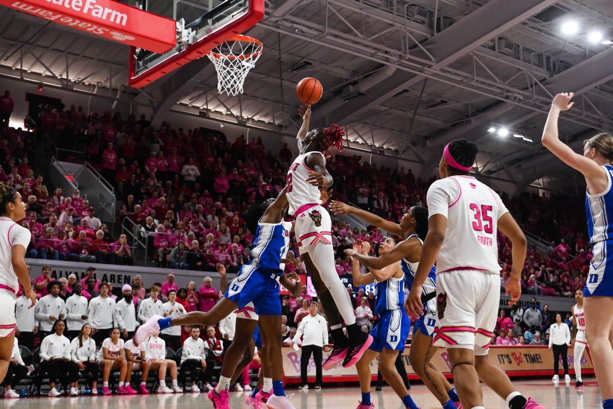Senior guard Saniya Rivers jumps to try to score during the Play4Kay game against Duke at Reynolds Coliseum on Monday, Feb. 3, 2025. Rivers scored 13 points for NC State. The Wolfpack beat the Blue Devils 89-83.