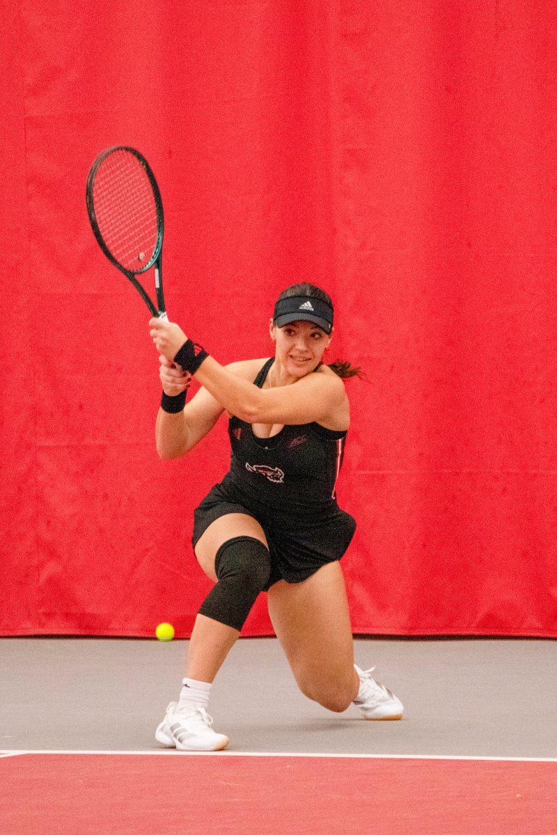 Freshman Michaela Laki during the match against Michigan at J.W. Isenhour Tennis Center on Friday, Feb. 14, 2025. Laki lost her singles match 2-0. NC State beat Michigan 5-2.