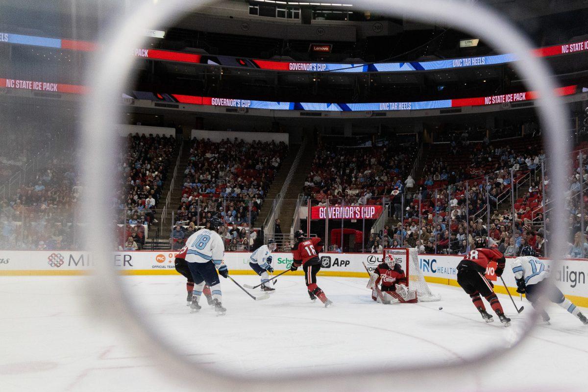 Junior goalie Isaac Tawyer watches for a shot during the Governors Cup against the University of North Carolina at the Lenovo Center on Sunday, Feb. 2, 2025. The Wolfpack beat The Tarheels 4-1.