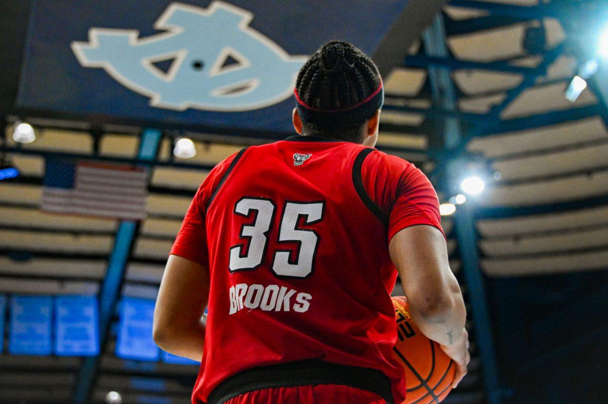 NC State guard Zoe Brooks prepares to inbound the ball during the game against UNC in Carmichael Arena on Sunday, Feb. 16, 2025. Brooks tallied 10 points in the matchup. NC State lost to UNC 66-65.
