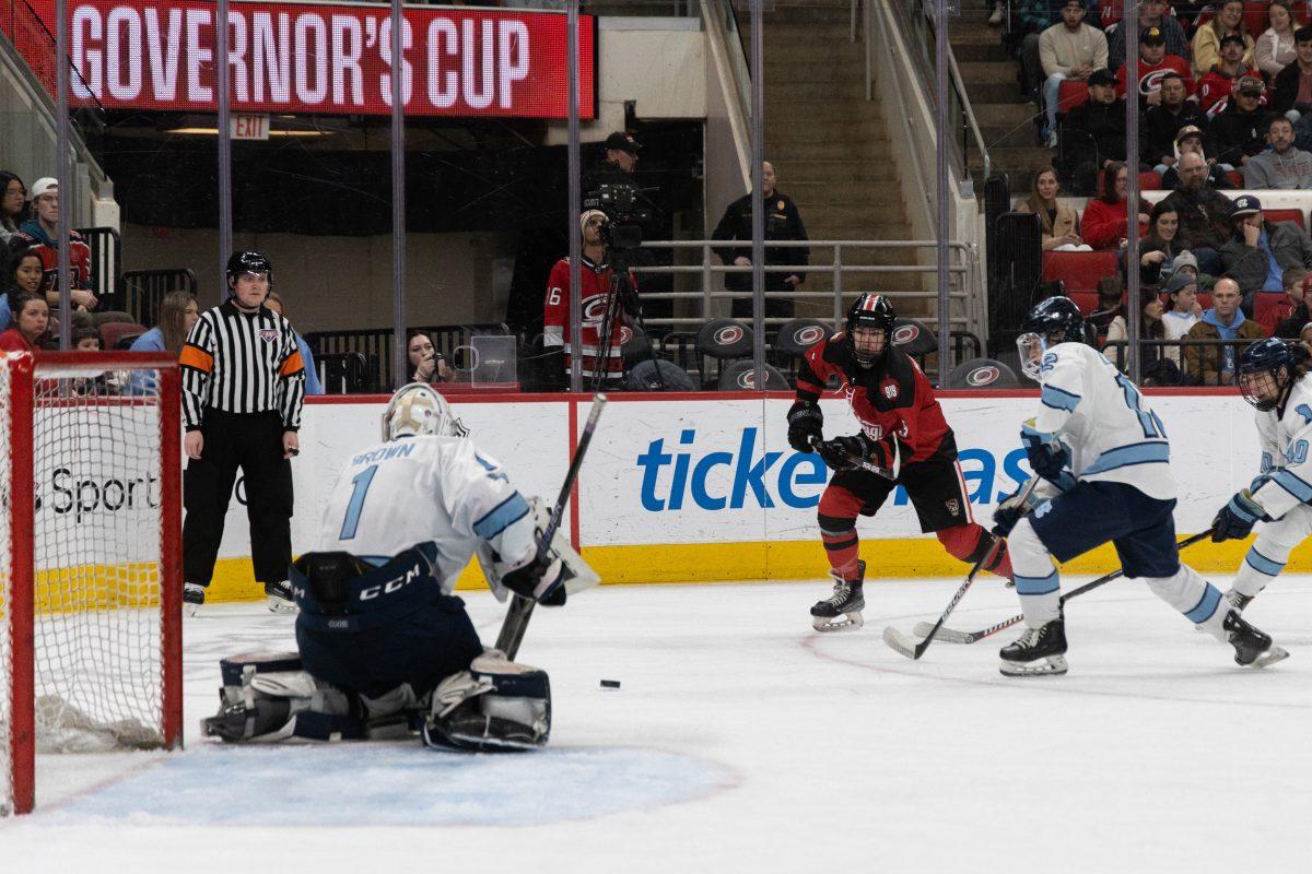 Junior forward Thomas McEneny shoots during the Governors Cup against the University of North Carolina at the Lenovo Center on Sunday, Feb. 2, 2025. The Wolfpack beat The Tarheels 4-1.