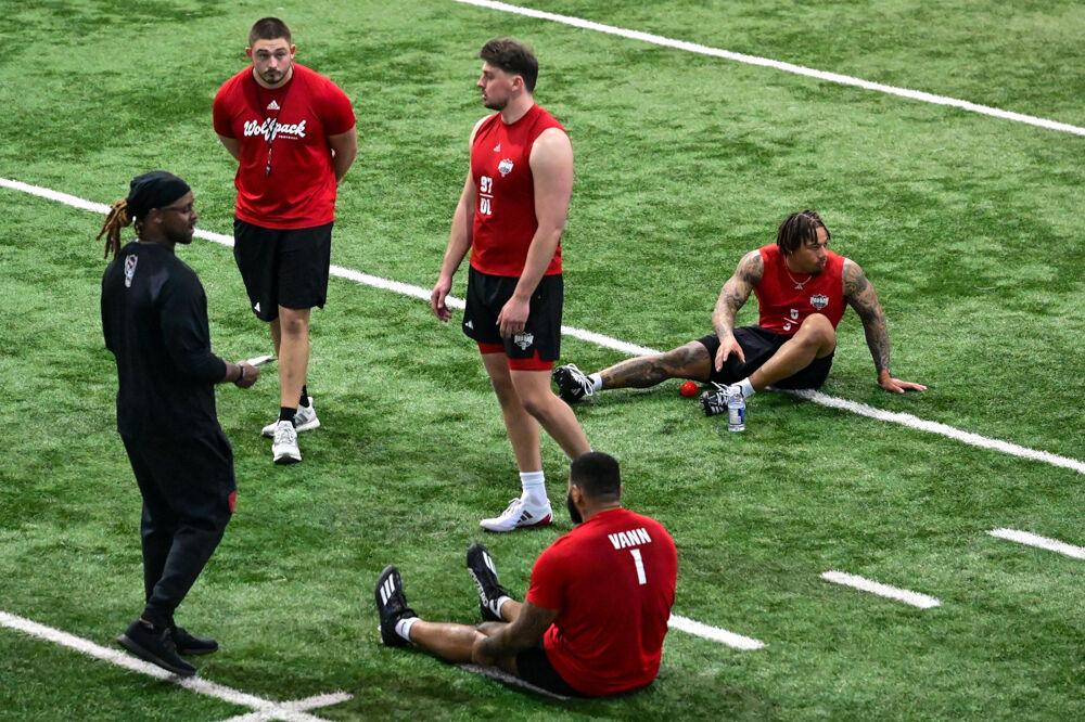 NC State football Pro Day participants sit and wait during NC State football's Pro Day in the Close-King Indoor Practice Facility&#160;on Tuesday, March 25, 2025. NC State players performed a variety of tasks in front of NFL scouts before the upcoming draft.