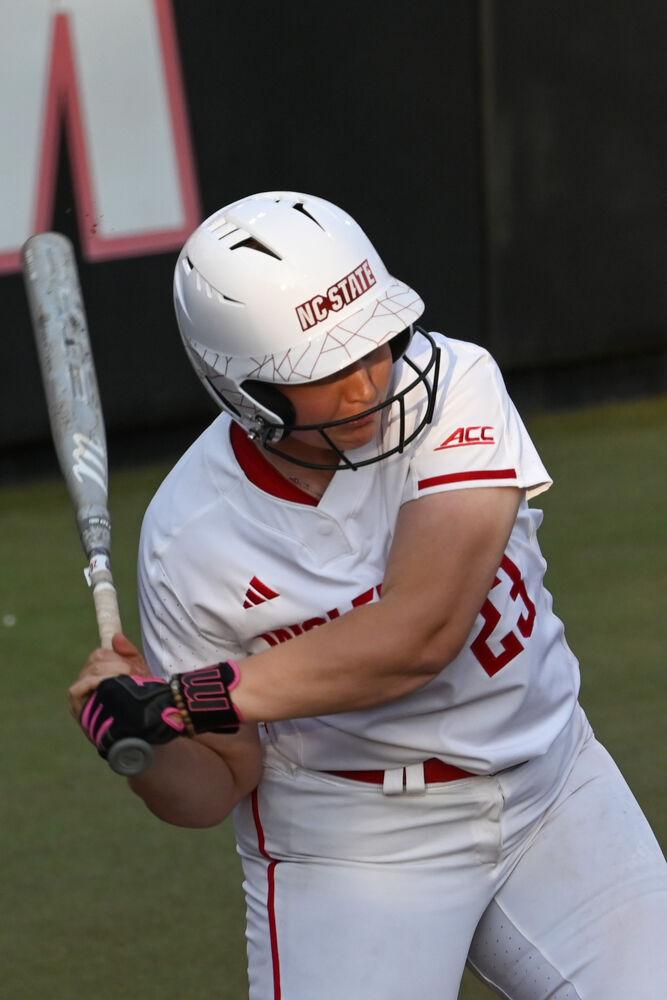 Junior catcher Hannah Church begins her swing while at bat during the game against UNC-Wilmington in Dail Softball Stadium on Saturday, March 1, 2025. Church scored three runs. NC State defeated UNC-Wilmington 14-1.