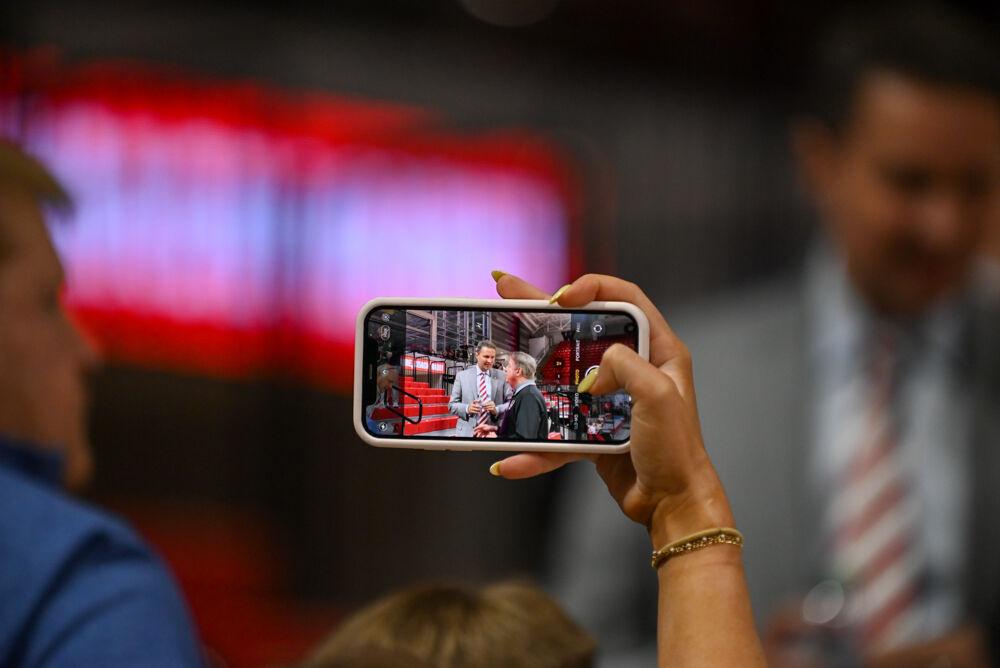 Will Wade and Wes Moore talk after Wade's introduction press conference in Reynolds Coliseum on Tuesday, March 25, 2025. The press confrence was held as an introduction for Coach Wade to NC States men's basketball team.