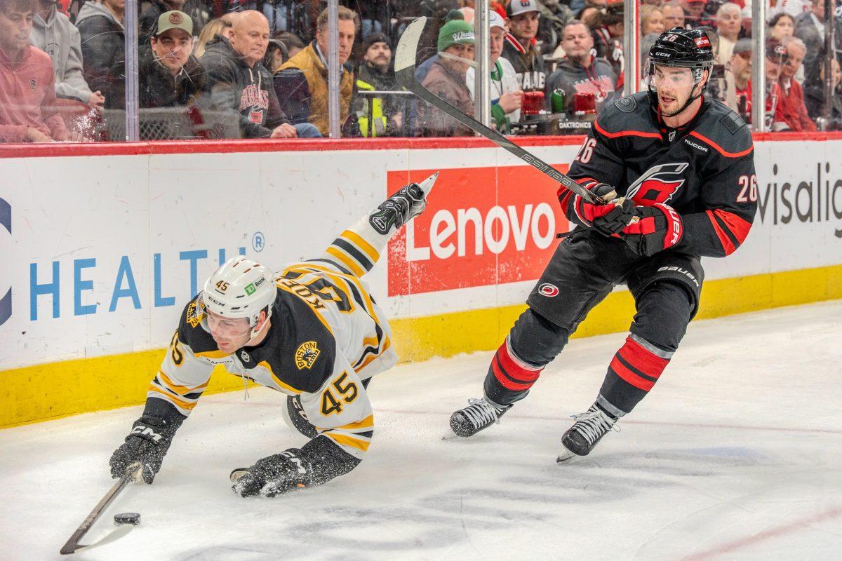 Boston winger Cole Koepke slips while chasing the puck during the game against the Carolina Hurricanes at the Lenovo Center on Saturday, March 6, 2025. Koepke had one hit. The Hurricanes beat the Bruins 3-2