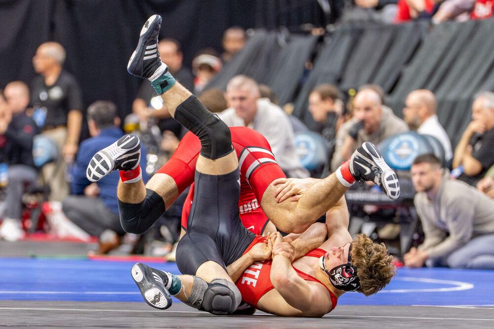 Redshirt freshman Koy Buesgens scrambles for a takedown during the NCAA Wrestling Championship Tournament in the Wells Fargo Center on Thursday, March 20, 2025.&#160;The Wolfpack placed eighth in the tournament with 46.5 points.