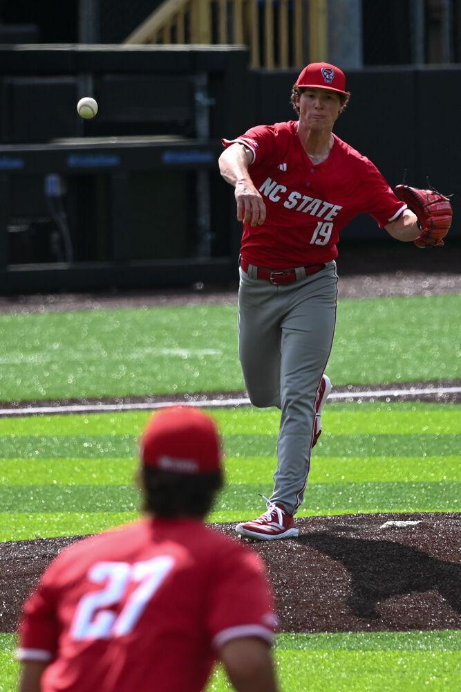 Sophomore right handed pitcher Heath Andrews picks off to first during the game against Duke at Jack Coombs Field on Saturday, March 29, 2025. Andrews had four strikeouts through four innings. NC State beat Duke 14-6.
