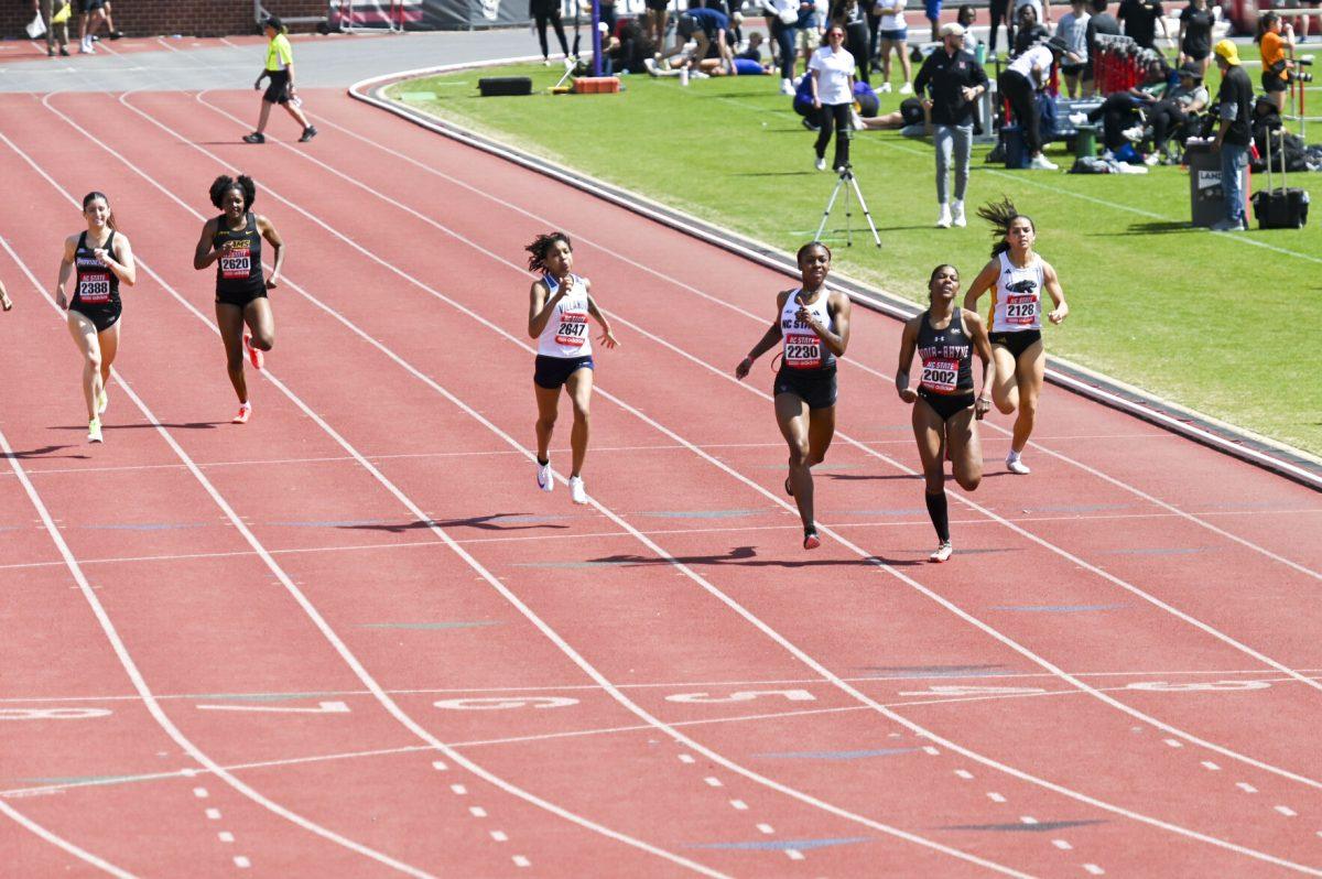 Sophomore sprinter Jordyn Parker crosses the finish line during the Raleigh Relays track meet at the Derr Track and Field Facility on Friday, March 28, 2025. Parker finished second in her heat with a time of 55.62.