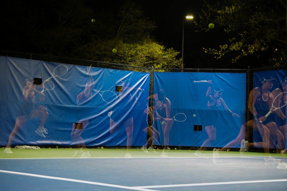 Freshman Mia Slama rushes back and forth across the court during the match against Duke at Ambler Tennis Stadium on Friday, March 21, 2025. Slama lost her singles match 1-2. NC State fell to Duke 3-4.