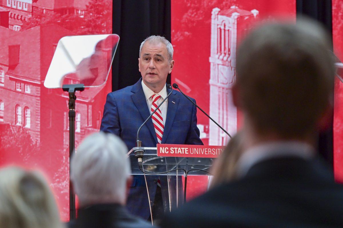 Ed Stack, vice chair of the board of trustees and chair of the chancellor search advisory committee, speaks to the crowd during the new chancellor announcement in Talley Student Union on Tuesday, March 18, 2025. Kevin Howell will be the 15th chancellor of NC State and the first Black chancellor.