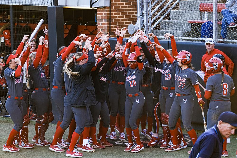 The NCSU softball team celebrates a home run during the game against UNC-Wilmington at Dail Softball Stadium on Feb. 28, 2025. The team scored two home runs. NC State lost to UNC-Wilmington 5-4.