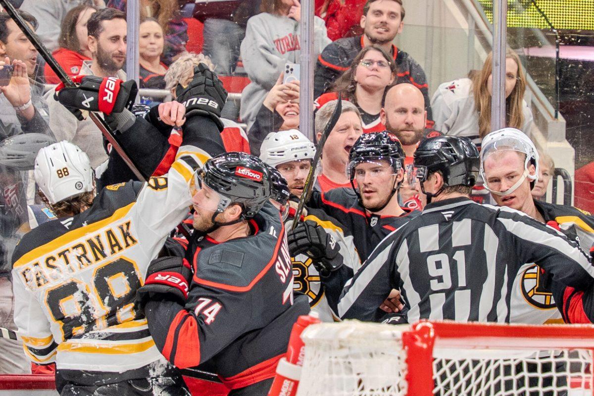 Multiple Boston and Carolina players engage in a physical altercation during the game against the Boston Bruins at the Lenovo Center on Saturday, March 6, 2025. The Hurricanes beat the Bruins 3-2.