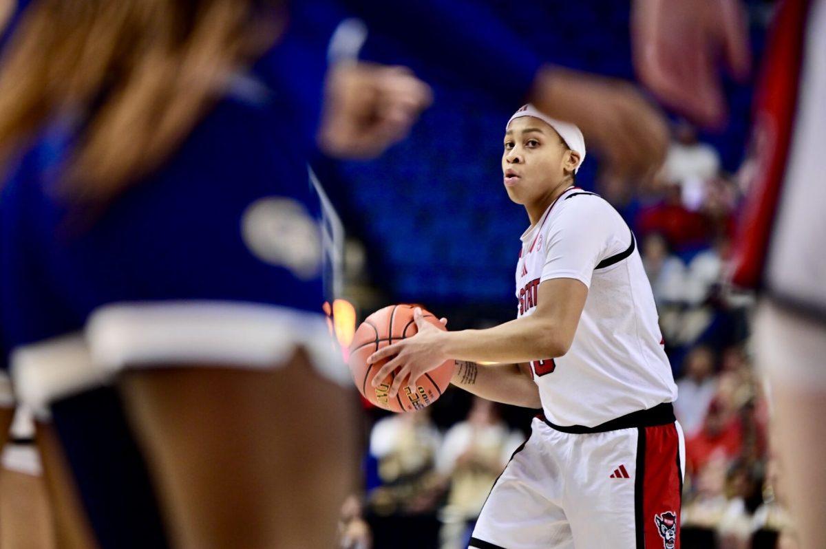 Sophomore guard Zoe Brooks looks for an opening during the quarterfinals game of the ACC Tournament against Georgia Tech&#160;on Friday, March 7, 2025. Brooks led in rebounds and assists with nine and four respectively. NC State won the game 73-72.