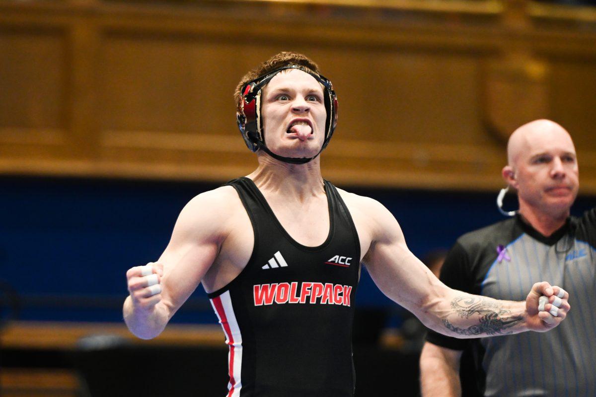 Redshirt senior Kai Orine celebrates winning his bout during the ACC Wrestling Championship Tournament in Cameron Indoor Stadium on Sunday, March 9, 2025. Orine placed second in the 133 weight class. The Wolfpack placed third overall with 62.5 points.