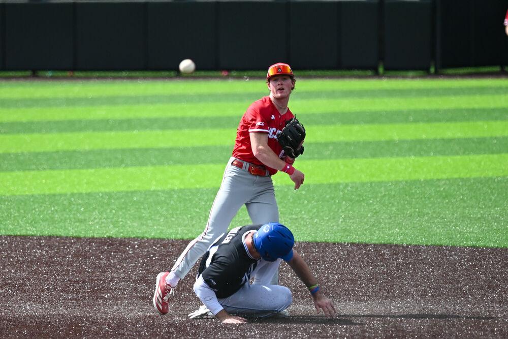 Sophomore infielder Luke Nixon throws it to first for a double play during the game against Duke at Jack Coombs Field&#160;on Saturday, March 29, 2025.&#160;Nixon had two hits in four at bats with one home run. NC State beat Duke 14-6.