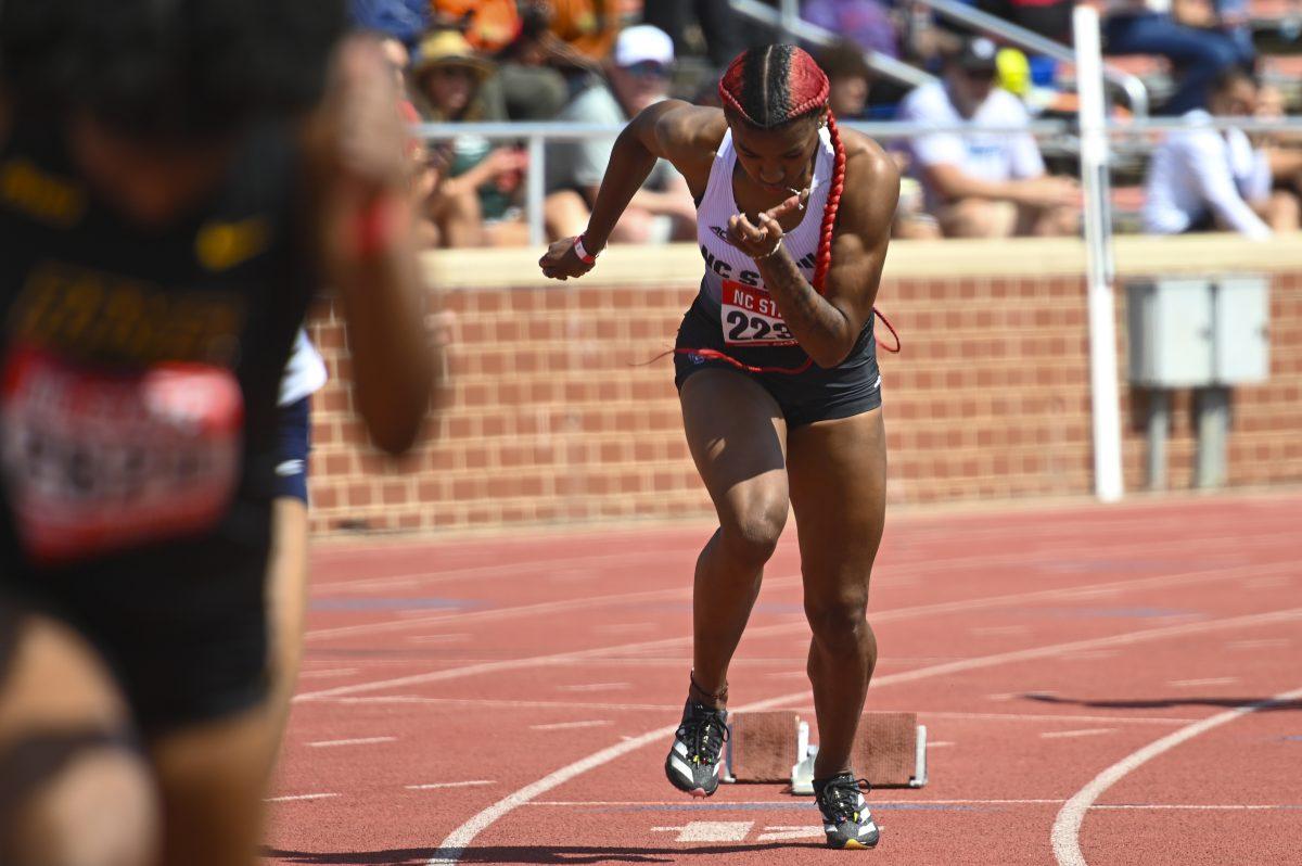 Sophomore sprinter Jordyn Parker launches off the blocks during the Raleigh Relays track meet at the Derr Track and Field Facility on Friday, March 28, 2025. Parker finished second in her heat with a time of 55.62.