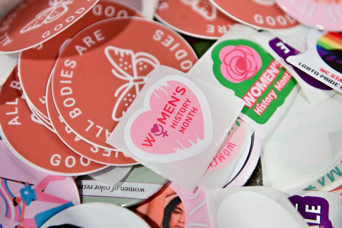 Stickers lay during A Womanist History of Scrapbooks and Zines event in the Women's Center on Tuesday, March 25, 2025. The Women's Center hosted the event to examine the role of scrapbooks and zines in feminist and womanist movements.