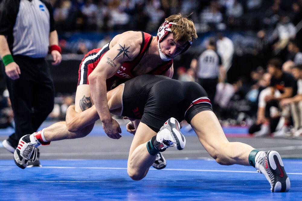 Senior Ed Scott resists his opponent's advance during the NCAA Wrestling Championship Tournament in the Wells Fargo Center on Friday, March 21, 2025.