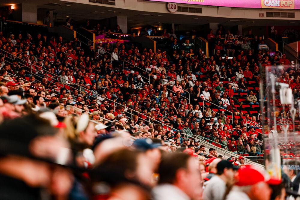Fans watch on during the first period of the Hurricanes game against the Nashville Predators at the Lenovo Center on Tuesday, March 25, 2025. The Hurricanes lost 3-1.
