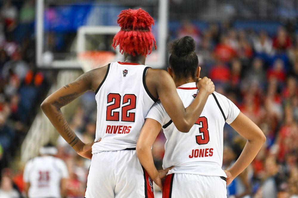 Senior guard Saniya Rivers (left) hugs freshman guard Zamareya Jones (right) during the championship game of the ACC Tournament against Duke in Greensboro Coliseum on Friday, March 7, 2025. The Wolfpack lost to the Blue Devils 76-62.
