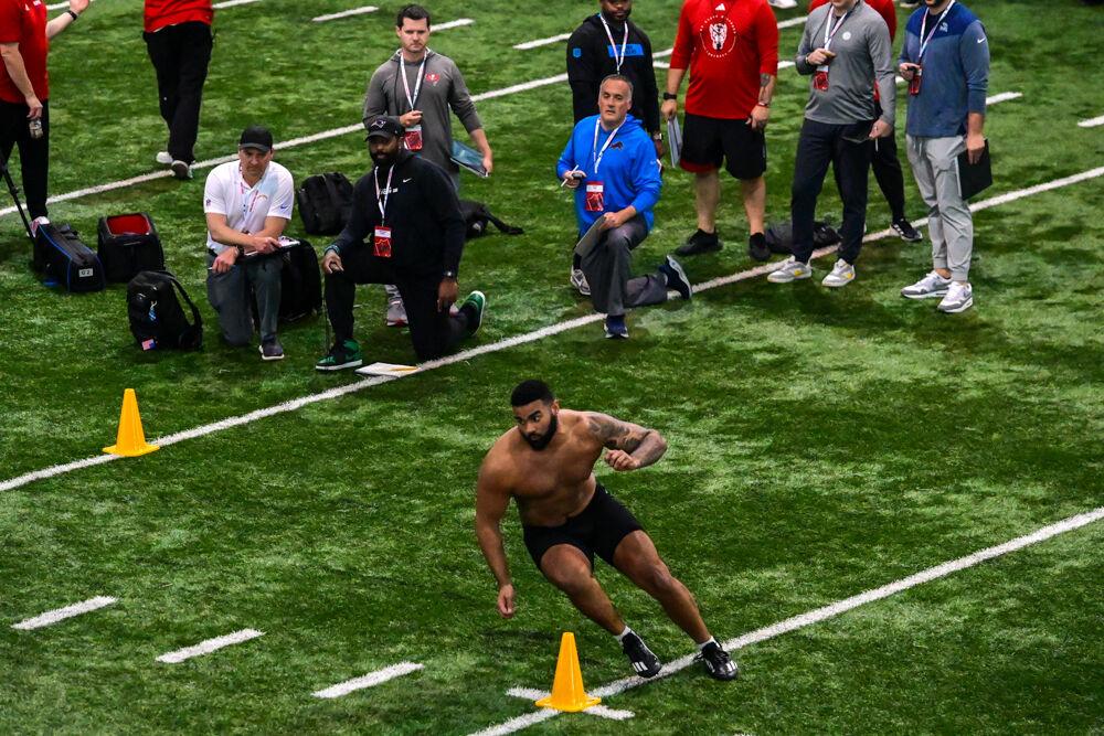 Senior defensive end Davin Vann performs a cone drill during NC State football's Pro Day in the Close-King Indoor Practice Facility&#160;on Tuesday, March 25, 2025. NC State players performed a variety of tasks in front of NFL scouts before the upcoming draft.