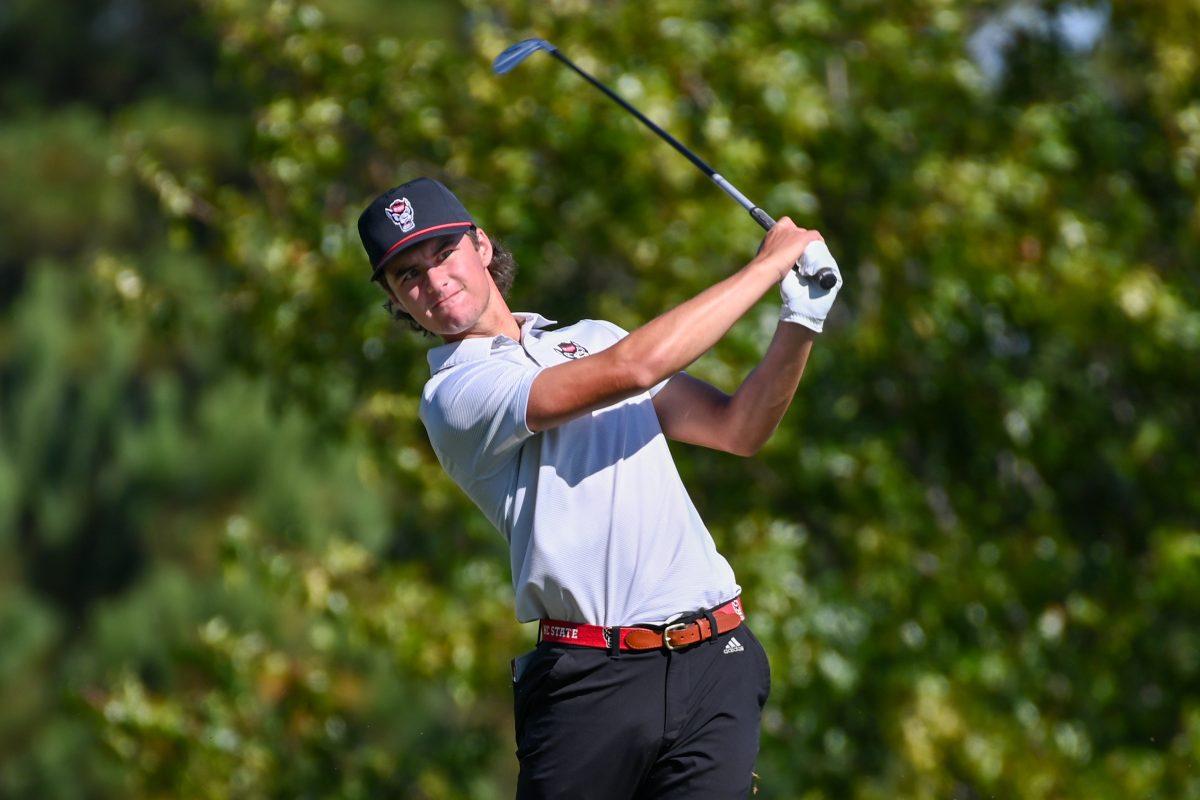 Freshman Joey Lenane tees off during the Wolfpack Intercollegiate tournament on Saturday, Oct. 15, 2022. Lenane had a score of 6-over. NC State tied for second place.
