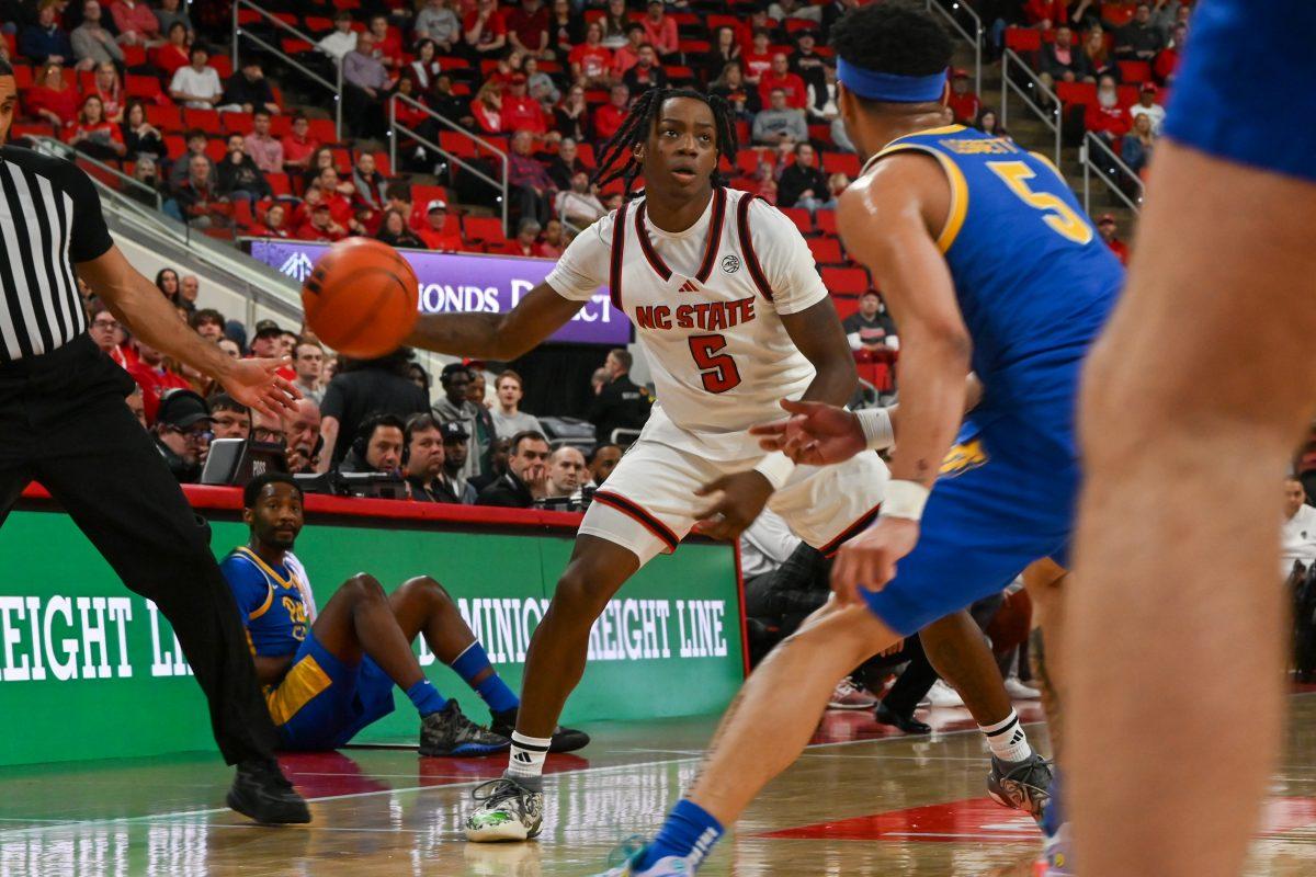 Freshman guard Trey Parker looks at the rim during the game against Pitt in the Lenovo Center on Wednesday, March 5, 2025. The Wolfpack beat the Panthers 71-63.