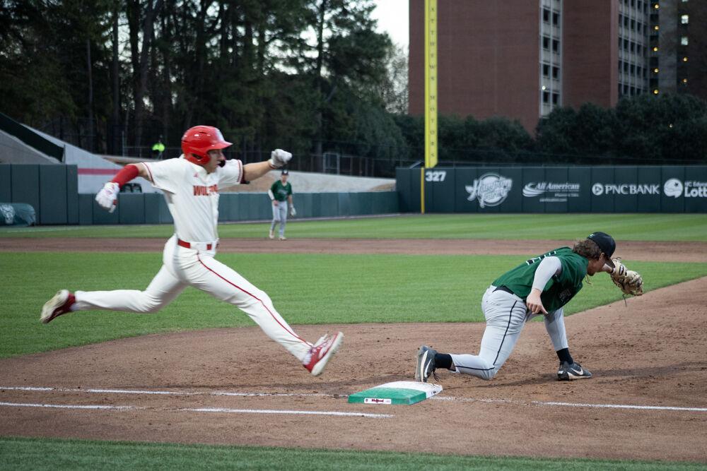 Junior outfielder Brayden Fraasman races to first base during the game against USC-Upstate on Doak Field at Dail Park on Tuesday, March 25, 2025. Fraasman scored one run during the game. The game ended in the eighth inning due to the mercy rule. The Wolfpack lost to the Spartans 15-5.