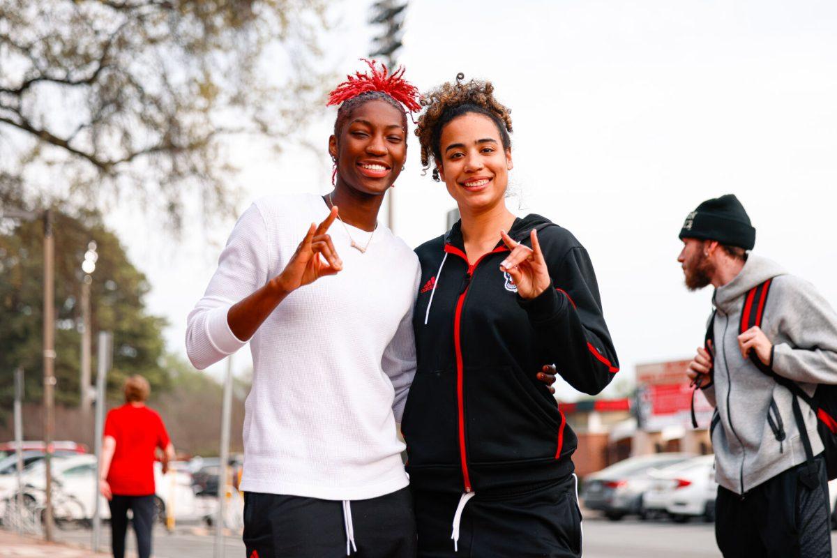 Senior guard Saniya Rivers and graduate guard Madison Hayes smile for a photo during the teams welcome back to Reynolds Coliseum on Saturday, March 29. Rivers and Hayes are both graduating this year to then head off to the WNBA.