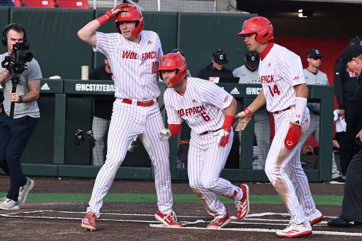 Junior infielder Matt Heavner runs towards the dugout after scoring the homerun during the game against Campbell on Doak Field at Dail Park on Wednesday, March 5, 2025. The Wolfpack defeated the Fighting Camels 11-1. Heavner recorded two hits including a home run for three RBIs.