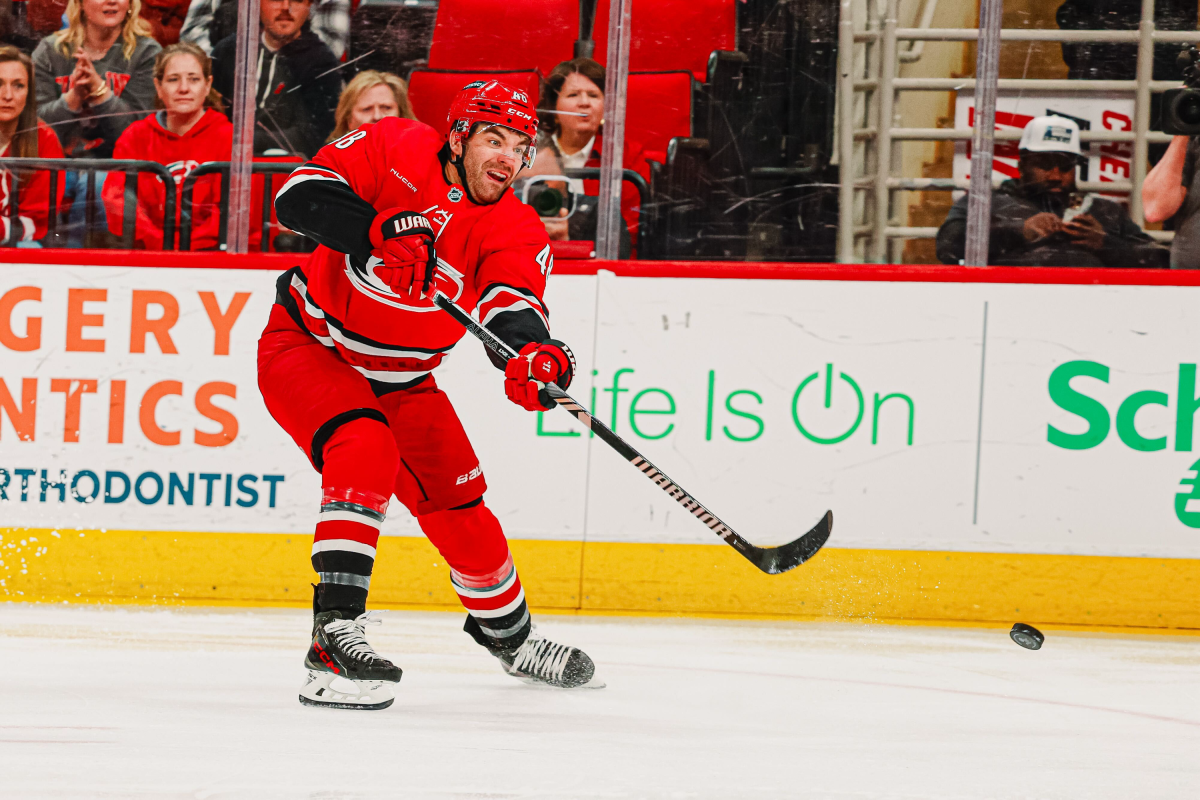 Carolina Hurricanes left wing Jordan Martinook shoots the puck during the game against the Nashville Predators at Lenovo Center on Tuesday, March 25, 2025. The Predators beat the Hurricanes 3-1.
