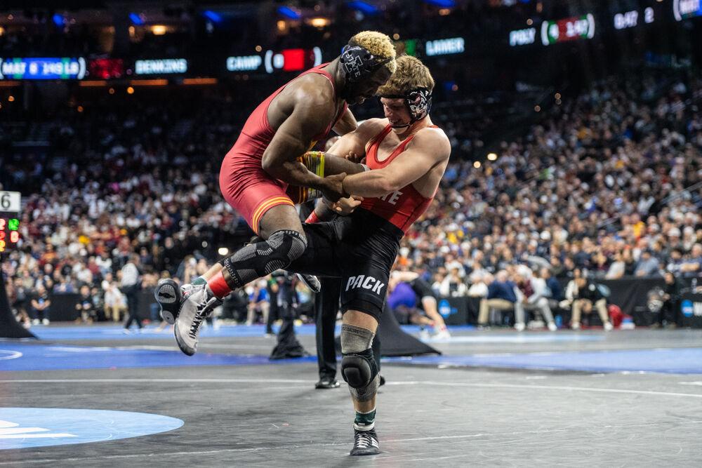 Redshirt freshman Koy Buesgens lifts his opponent during the NCAA Wrestling Championship Tournament in the Wells Fargo Center on Thursday, March 20, 2025.&#160;The Wolfpack placed eighth overall with 46.5 points.