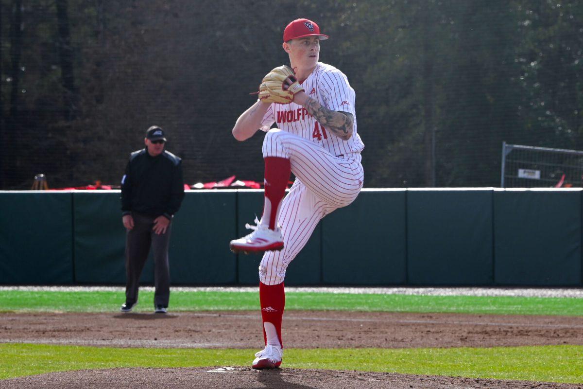 Sophomore pitcher Jacob Dudan begins to pitch during the game against Campbell on Doak Field at Dail Park on Wednesday, March 5, 2025. The Wolfpack defeated the Fighting Camels 11-1. Dudan struck out six batters and earned a win as the pitcher.