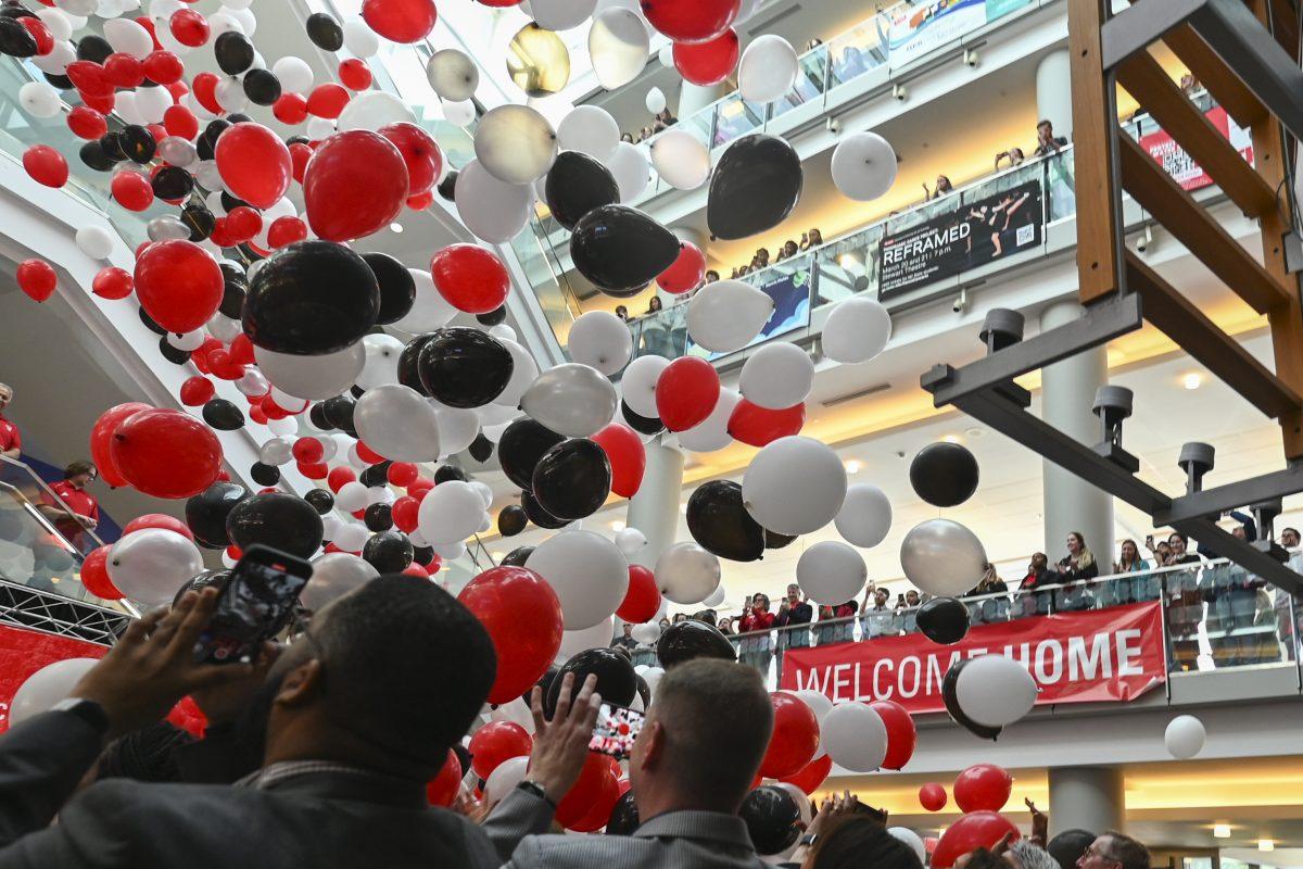 Balloons fall as NC State welcomes chancellor-elect Kevin Howell home during the new chancellor announcement in Talley Student Union on Tuesday, March 18, 2025. Howell is the third NC State graduate to be the chancellor. Prior to his election, Howell served as the chief external affairs officer at UNC Health.