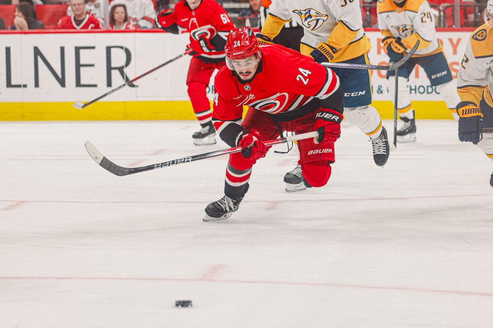 Center Seth Jarvis chases down the puck in the game against the Nashville Predators at the Lenovo Center on Tuesday, March 25, 2025. Jarvis had one assist during the game. The Hurricanes lost 3-1.