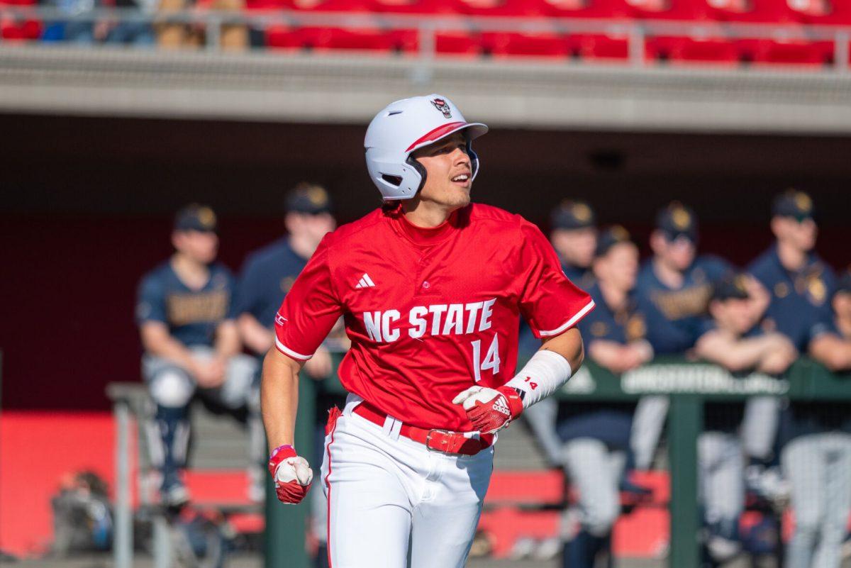 Freshman outfielder Ty Head watches as his ball leave the park while he jogs to first during the game against Canisius at Doak Field at Dail Park on Feb. 28, 2025. Head earned five RBI's including a grand slam. NC State beat Canisius 10-2 in the first game of the series.