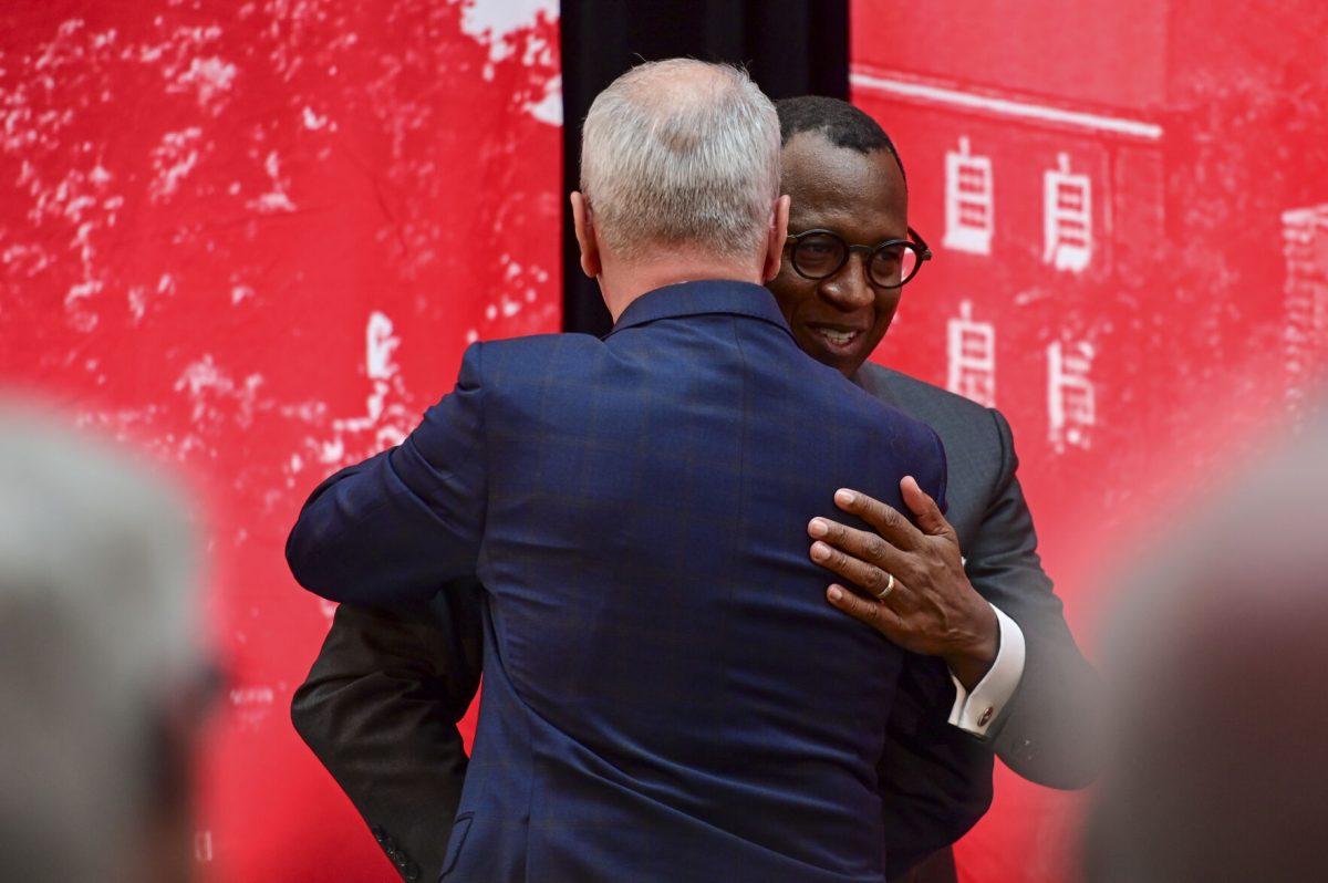Chancellor-elect Kevin Howell hugs Ed Stack, vice chair of the board of trustees and chair of the chancellor search advisory committee, during the new chancellor announcement in Talley Student Union on Tuesday, March 18, 2025. Howell will be the 15th chancellor of NC State and the first Black chancellor.