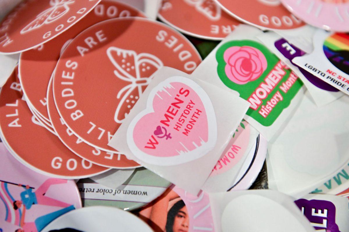 Stickers lay during A Womanist History of Scrapbooks and Zines event in the Women's Center on Tuesday, March 25, 2025. The Women's Center hosted the event to examine the role of scrapbooks and zines in feminist and womanist movements.