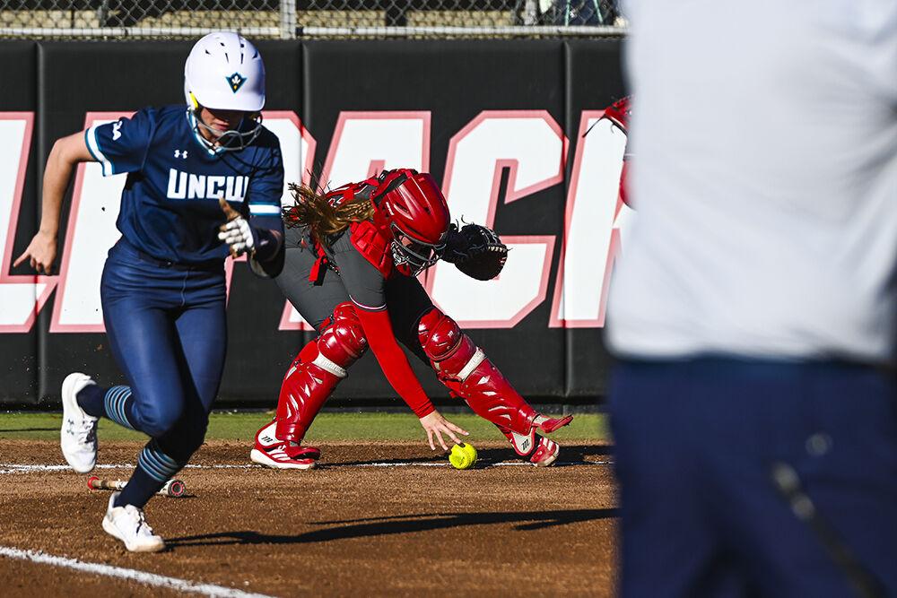 Junior catcher Ellington Whitaker grabs the ball during the game against UNC-Wilmington at Dail Softball Stadium on Friday, Feb. 28, 2025. NC State lost to UNC-Wilmington 5-4.