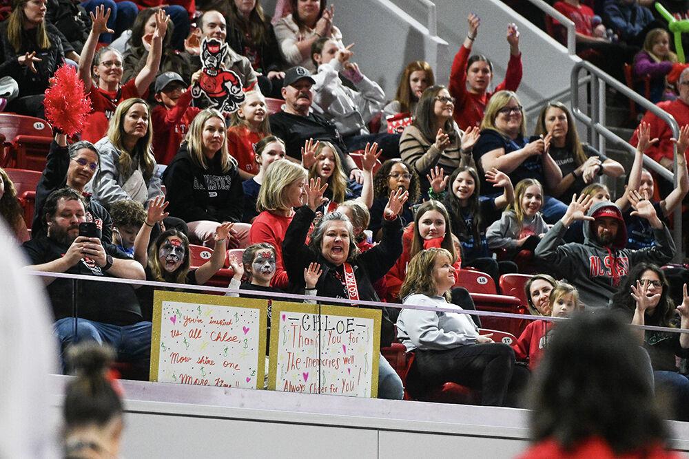 Fans cheer on the NC State Gymnastics team during the meet against Ohio State in Reynolds Coliseum on Friday, March 7, 2025. NC State defeated Ohio State 197.000-196.325.