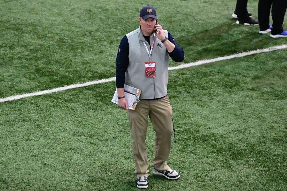 A Chicago Bears scout chats on the phone during NC State football's Pro Day in the Close-King Indoor Practice Facility&#160;on Tuesday, March 25, 2025. NC State players performed a variety of tasks in front of NFL scouts before the upcoming draft.