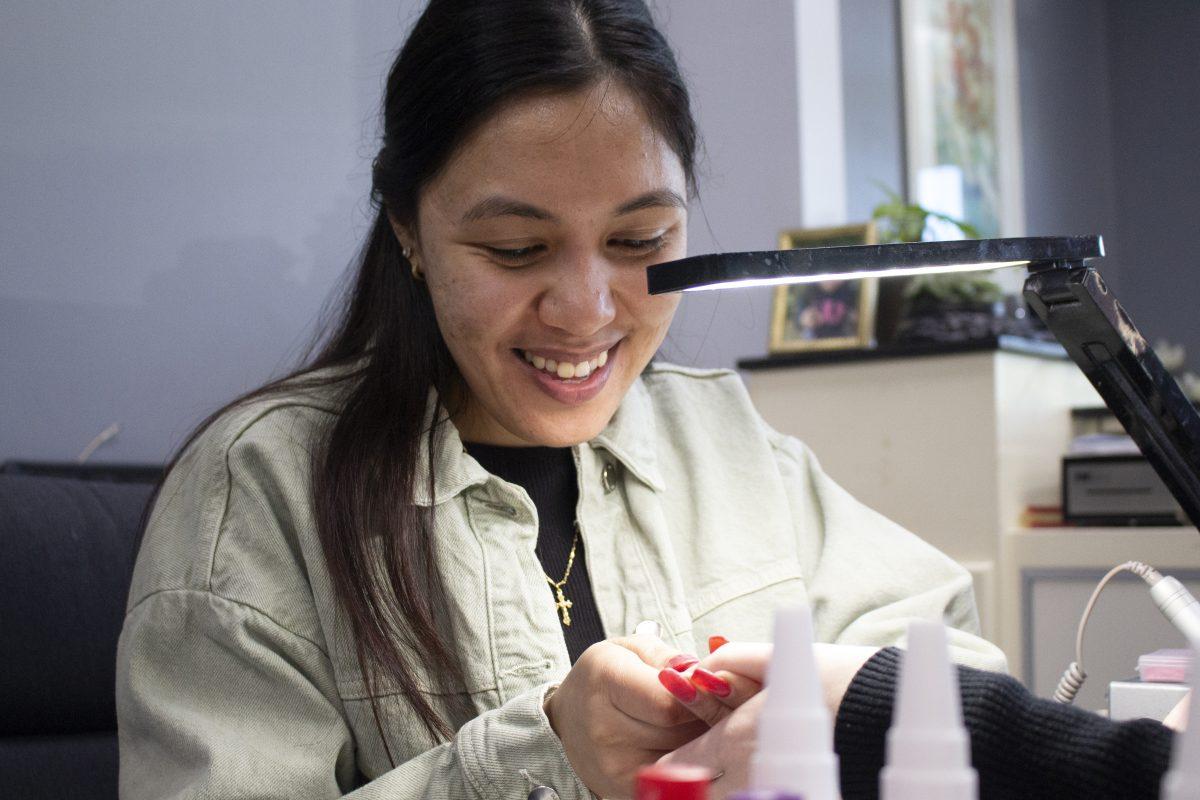 Thao Phan, a cofounder of Phantastic Nails, does a customers nails at Phantastic Nails & Spa located off Duraleigh Rd. on Friday, March 21, 2025. When speaking on her experinces working in a predominately women's space, Phan said "We laugh together, we cry together. We need these open spaces".