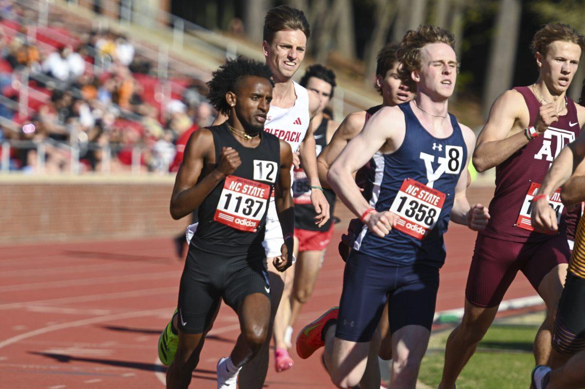 Sophomore distance runner Elliot McArthur runs around the corner during the Raleigh Relays track meet at the Derr Track and Field Facility on Thursday, March 27, 2025. McArthur finished in fifth in his heat of the 1500m with a time of 3:45.10.