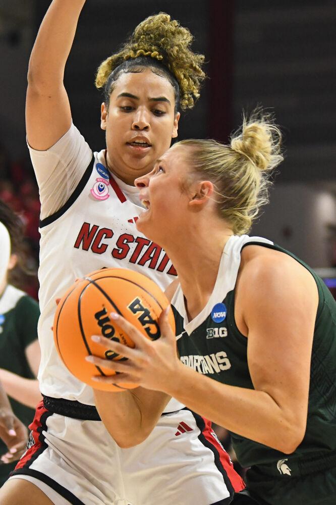 Graduate guard Madison Hayes defends the basket during the second round game of the NCAA Tournament against Michigan State in Reynolds Coliseum on Monday, March 24, 2025. Hayes scored 17 points and made nine rebounds. NC State won the game 83-49.