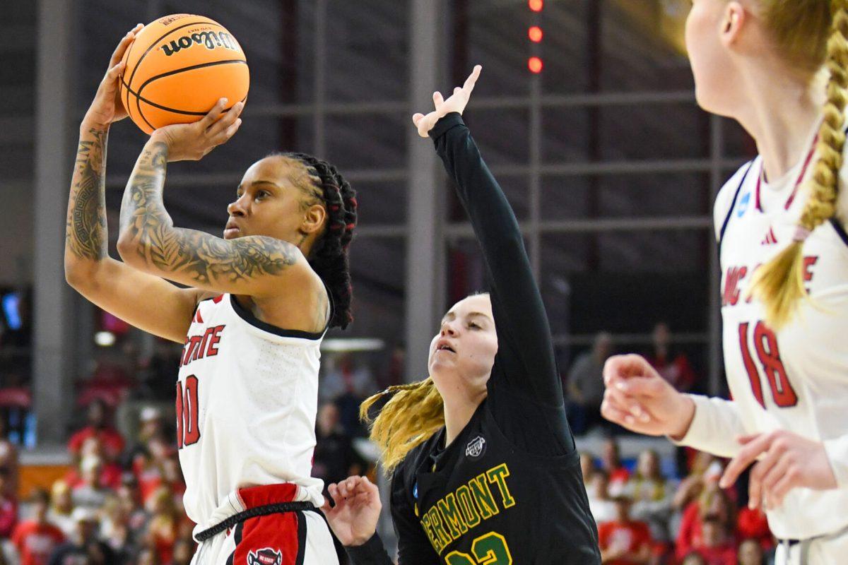 Senior guard Aziaha James aims at the net during the first round game of the NCAA Tournament against Vermont in Reynolds Coliseum on Saturday, March 22, 2025. James scored 15 points, on top of making four rebounds and three assists. NC State won the game 75-55.
