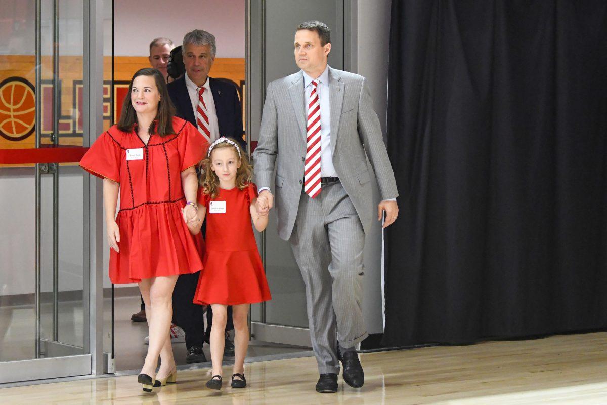 Will Wade, the new head coach of NC State men's basketball, walks into a press conference discussing his hiring in Reynolds Coliseum on Tuesday, March 25, 2025. Wade is the Wolfpack's 21st men's basketball coach, following after former coach Kevin Keatts.